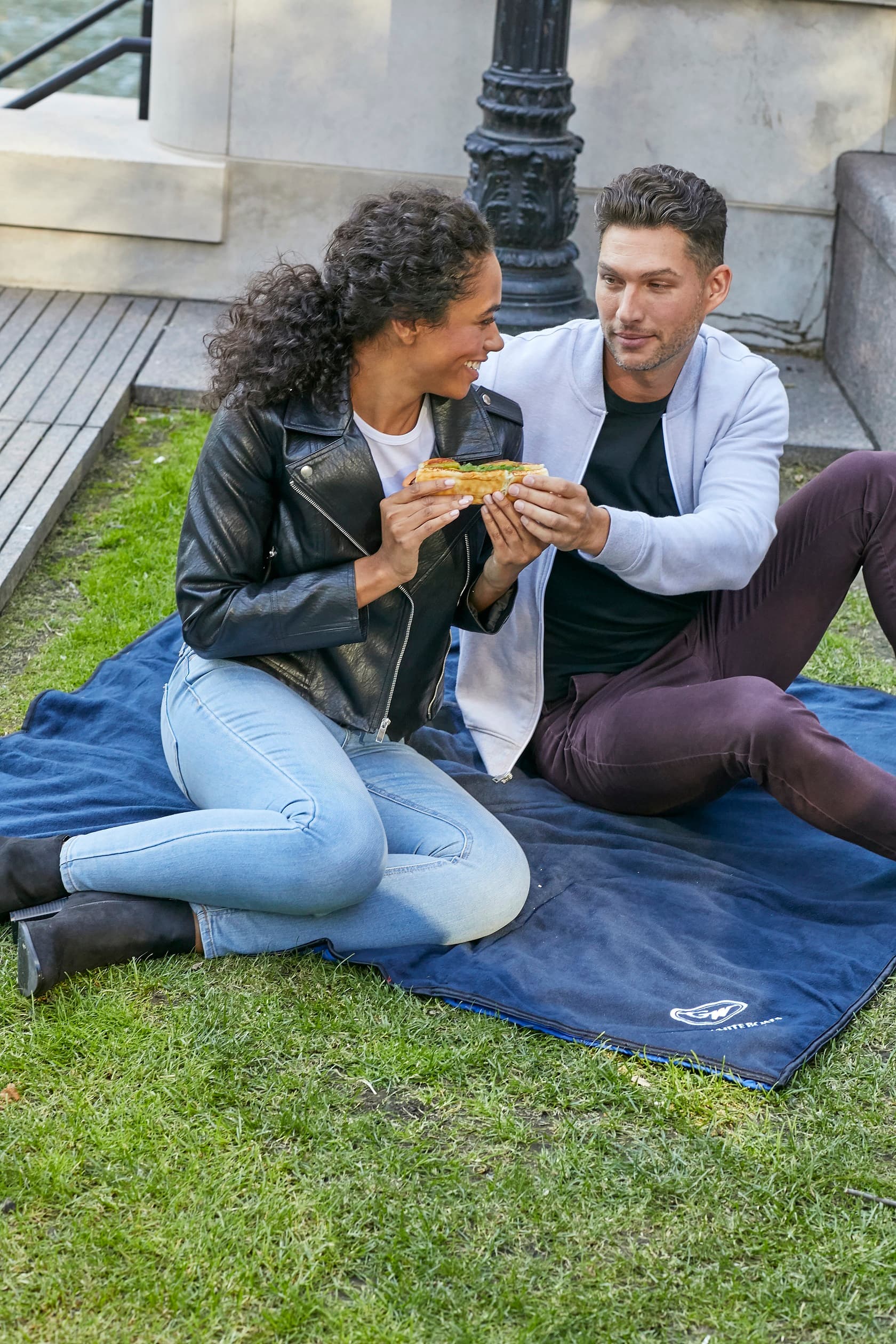 4-in-1 Blanket/Poncho/Seat Cushion/Backpack (TM)